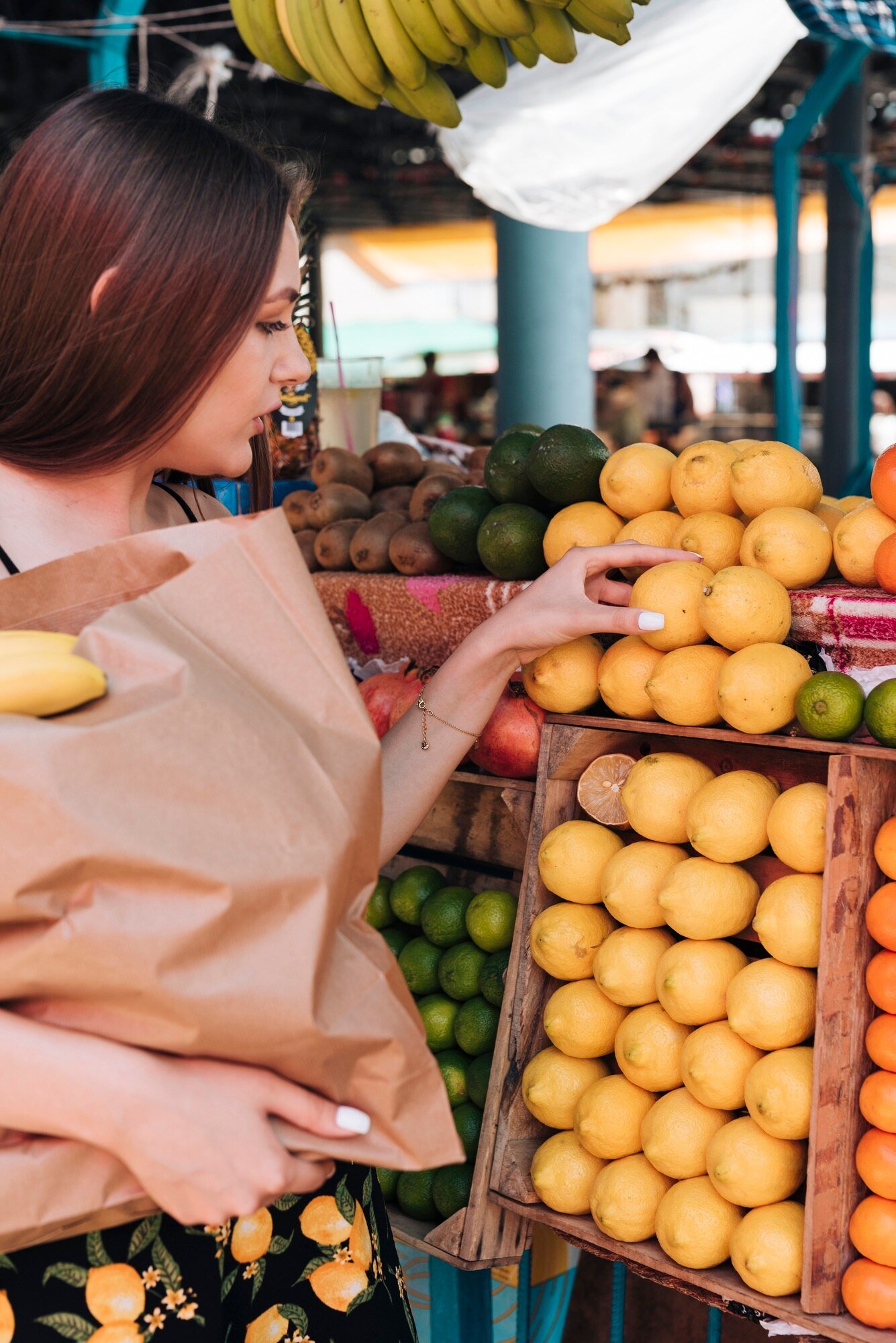 close-up-woman-holding-paper-bag_23-2148238098