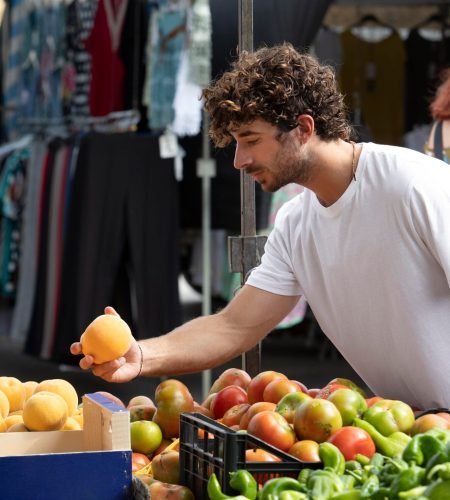 close-up-young-man-food-market_23-2149082576